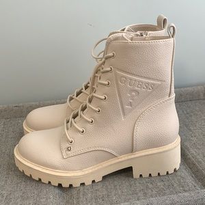 Guess combat boots. Sz 6.5 in Women’s. Brand new.